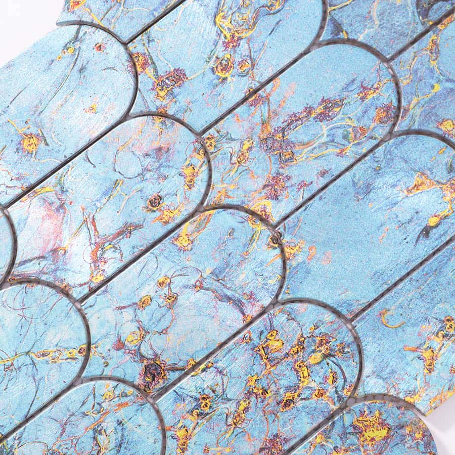 Macro texture view of blue scallop tile with gold and violet marble veining