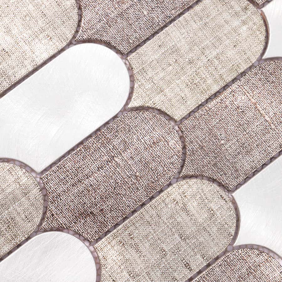  Macro view of scallop mosaic tile showing fabric texture and brushed finish