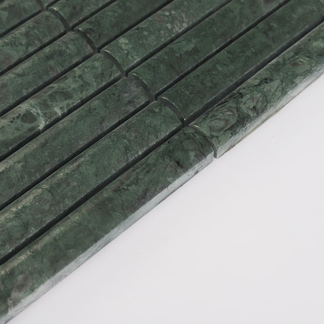 Angled perspective showing the thickness and side profile of green marble strips.