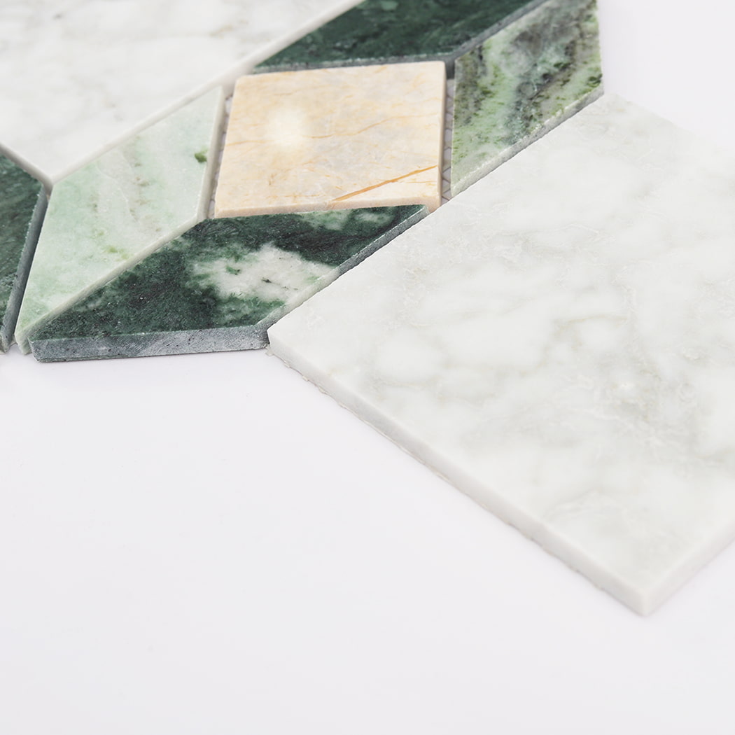 Low angle view showing the thickness and clean edges of the natural stone mosaic pieces.