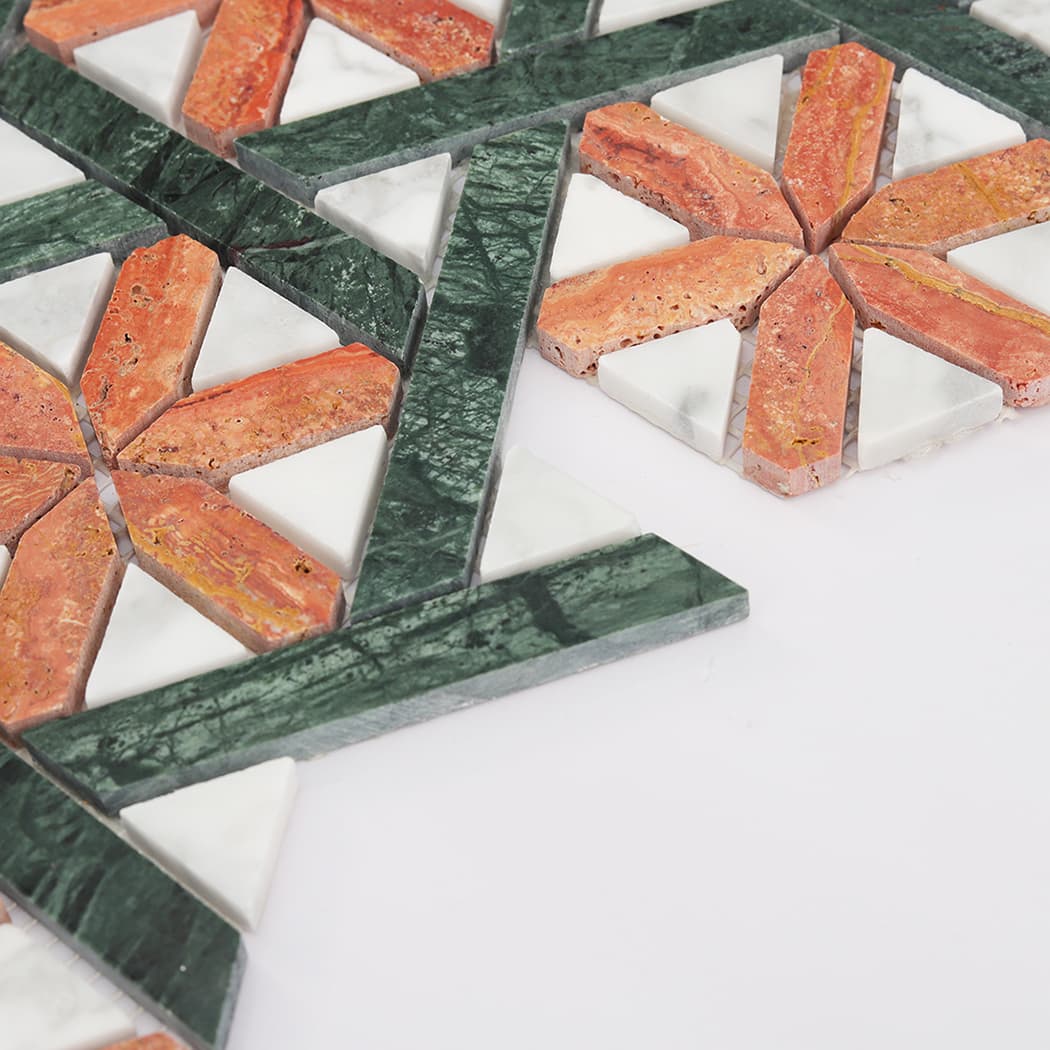 Side view of interwoven geometric marble tile, highlighting its intricate design and thickness.