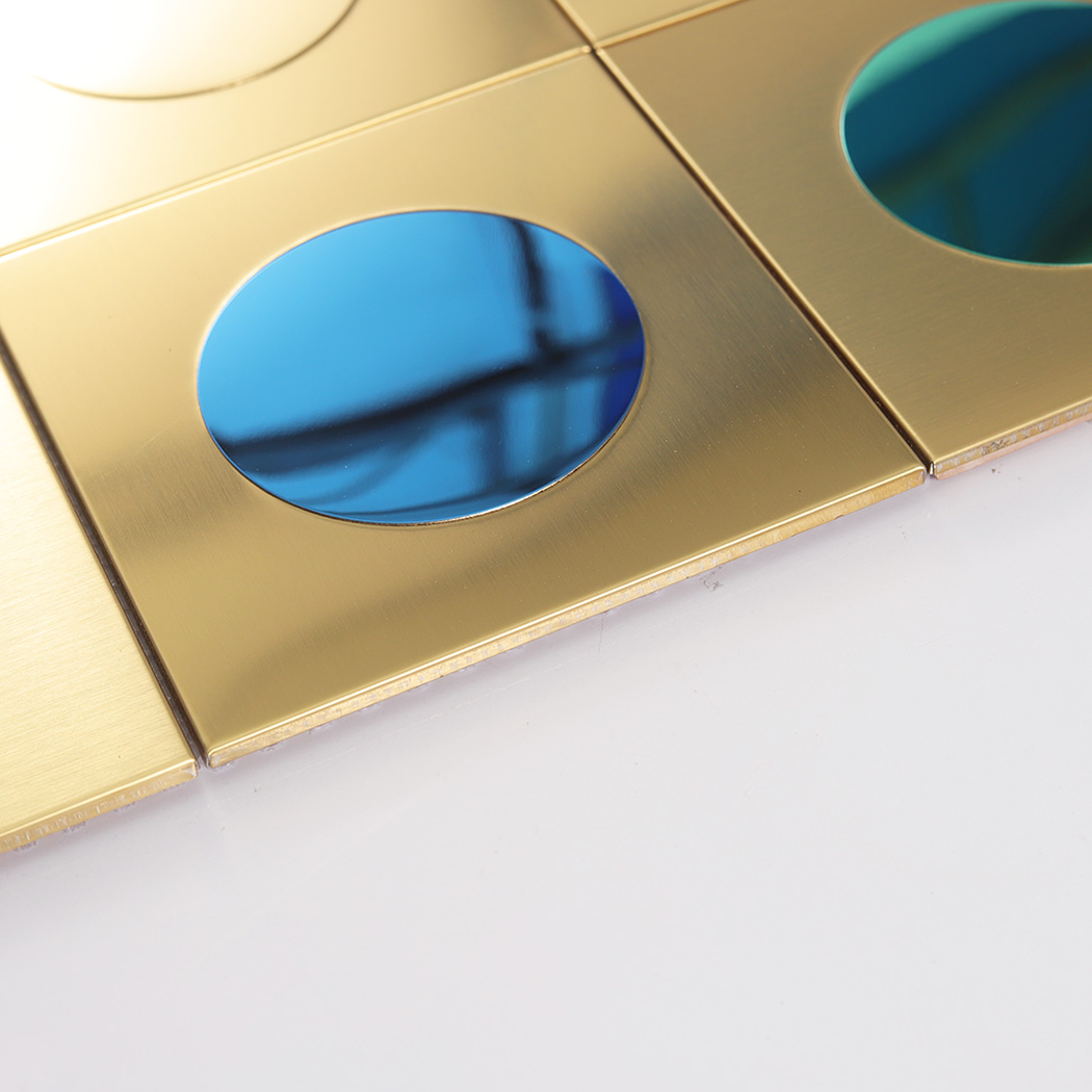 A low-angle side view showing the thickness and edge of a gold tile with a blue mirror.