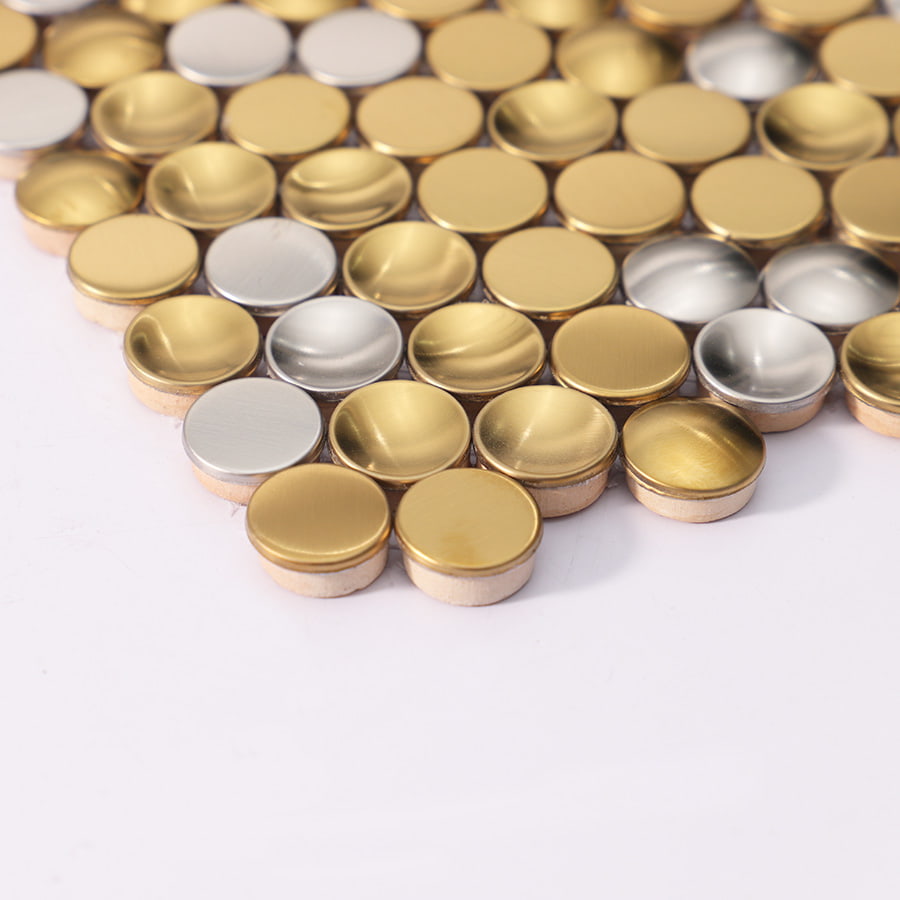 Side view of gold and silver round metallic mosaic tiles