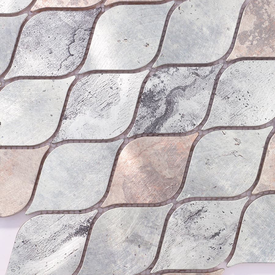 Diagonal view of silver and bronze leaf mosaic tile sheet