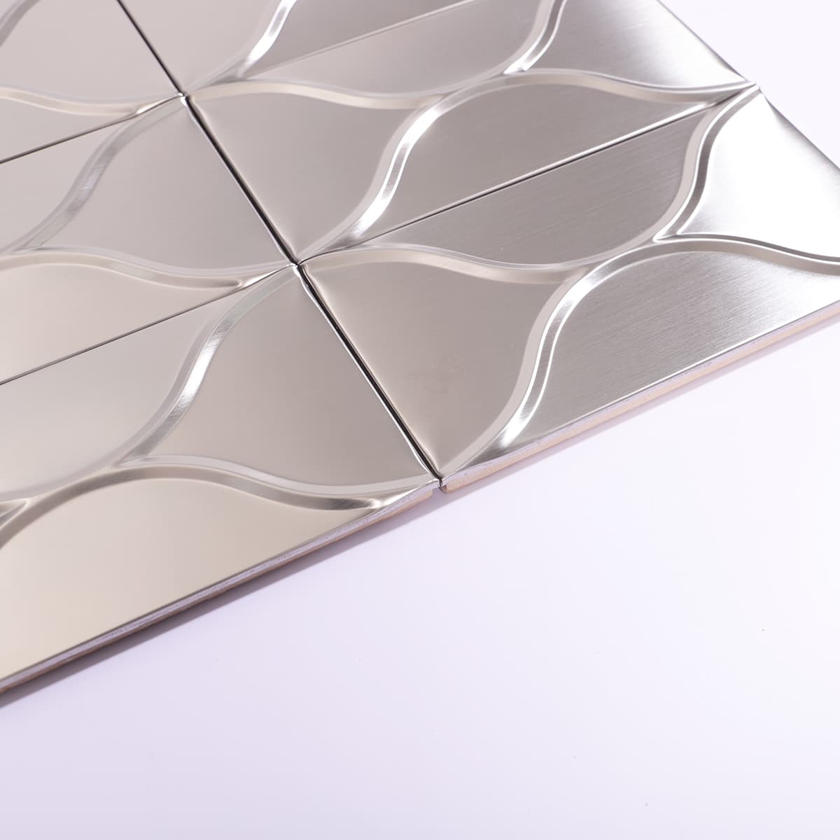 Close-up of silver metal tile edge and finish