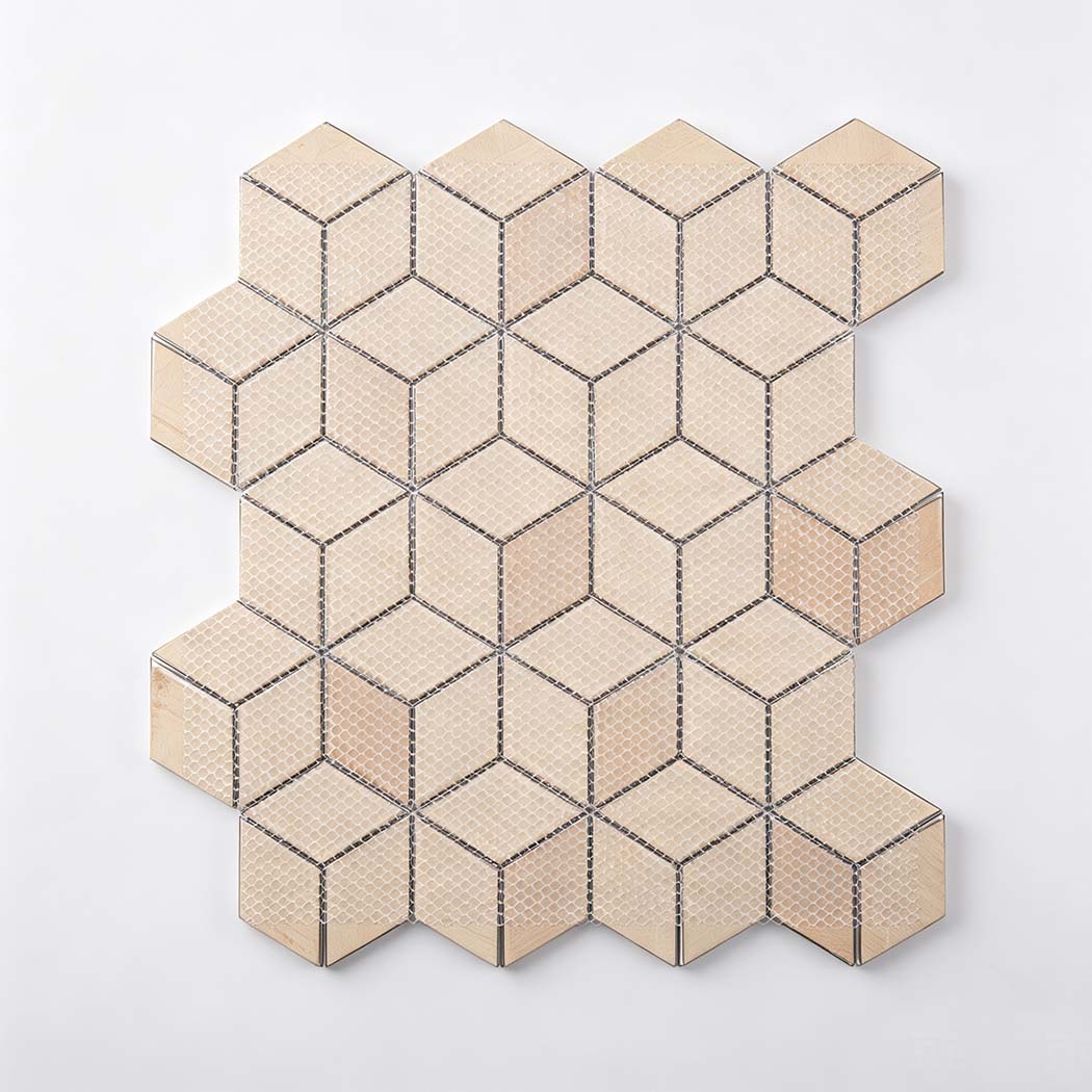 Mesh-backed reverse side of silver and gray hexagon aluminum mosaic tile