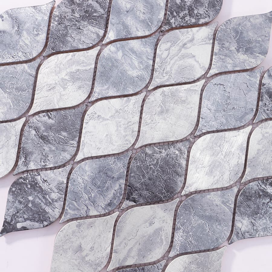 Diagonal angle view of silver gray aluminum leaf mosaic tile