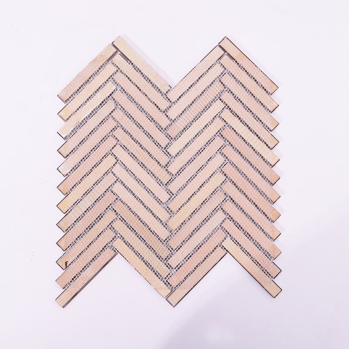 Back view of brushed silver herringbone mosaic tile