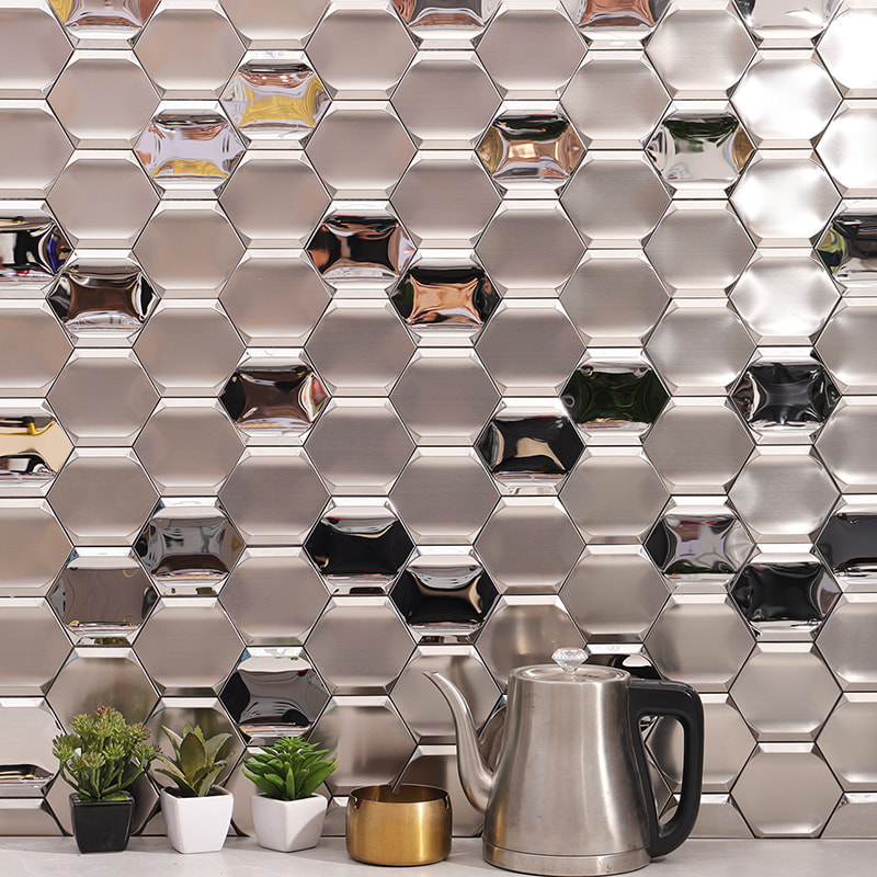 Close-up of silver hexagon metal mosaic tiles in mirror and brushed finishes