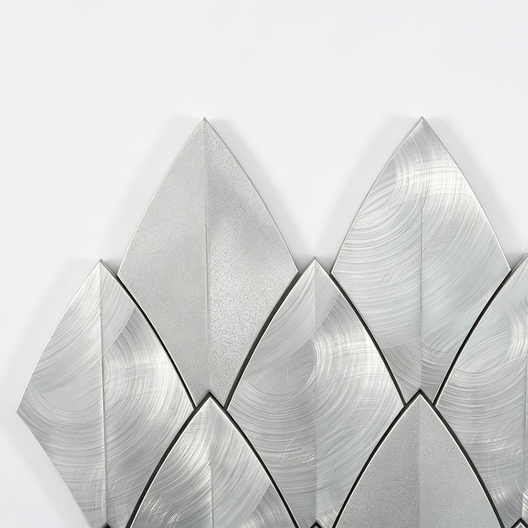 Top angle view of brushed silver leaf shape aluminum mosaic tile