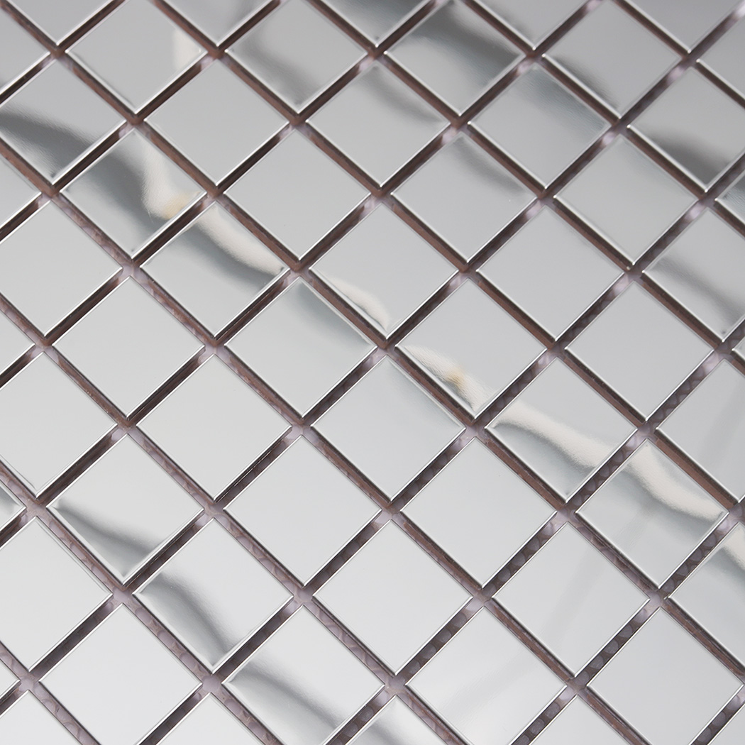 Close-up of silver mirror square mosaic tiles with smooth reflective finish