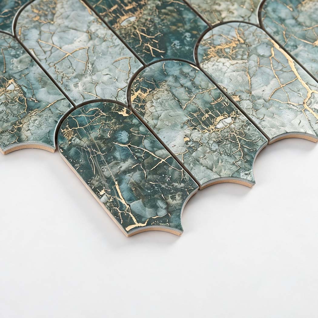 Side view of curved bottom edge on slate green gold fish scale tile