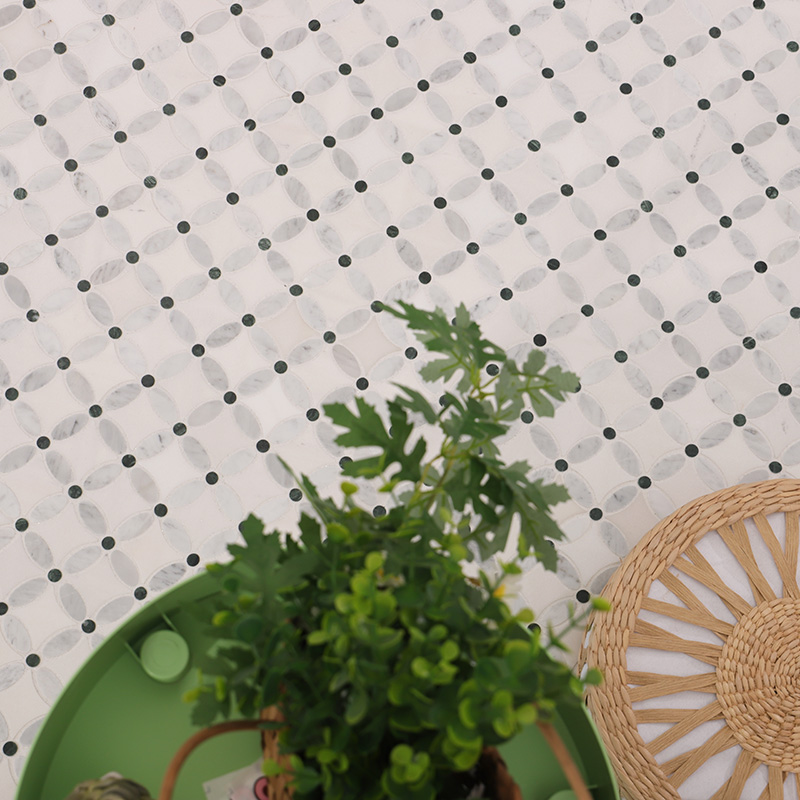Small floor tiles in white with black dot accents for modern flooring