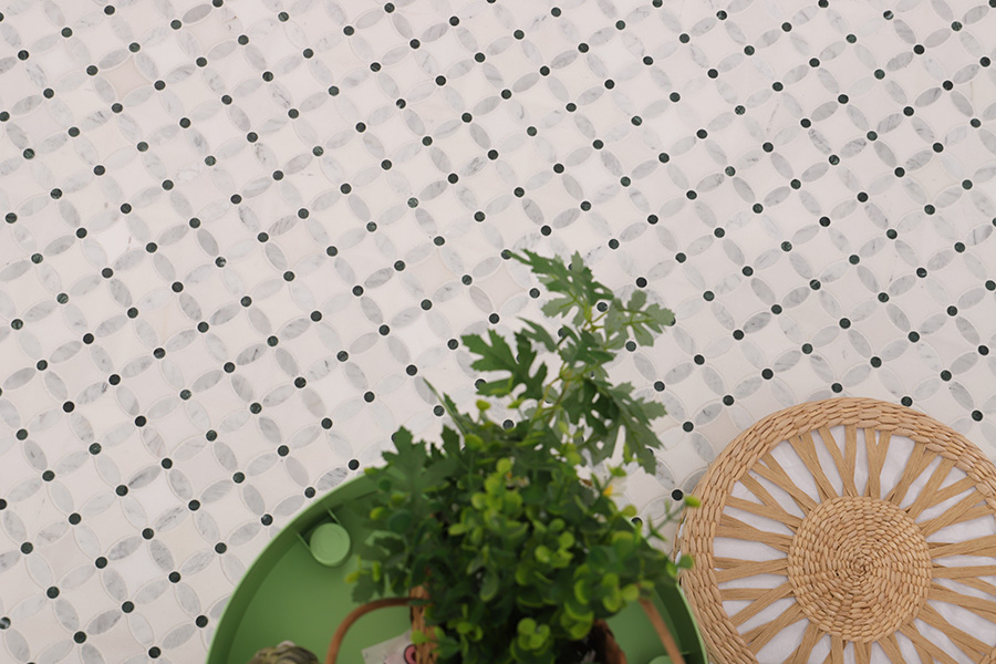 Elegant small floor tiles with white marble look and black dot design