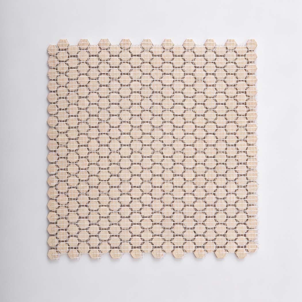 Reverse mesh backing view of small hexagon rose gold aluminum tile