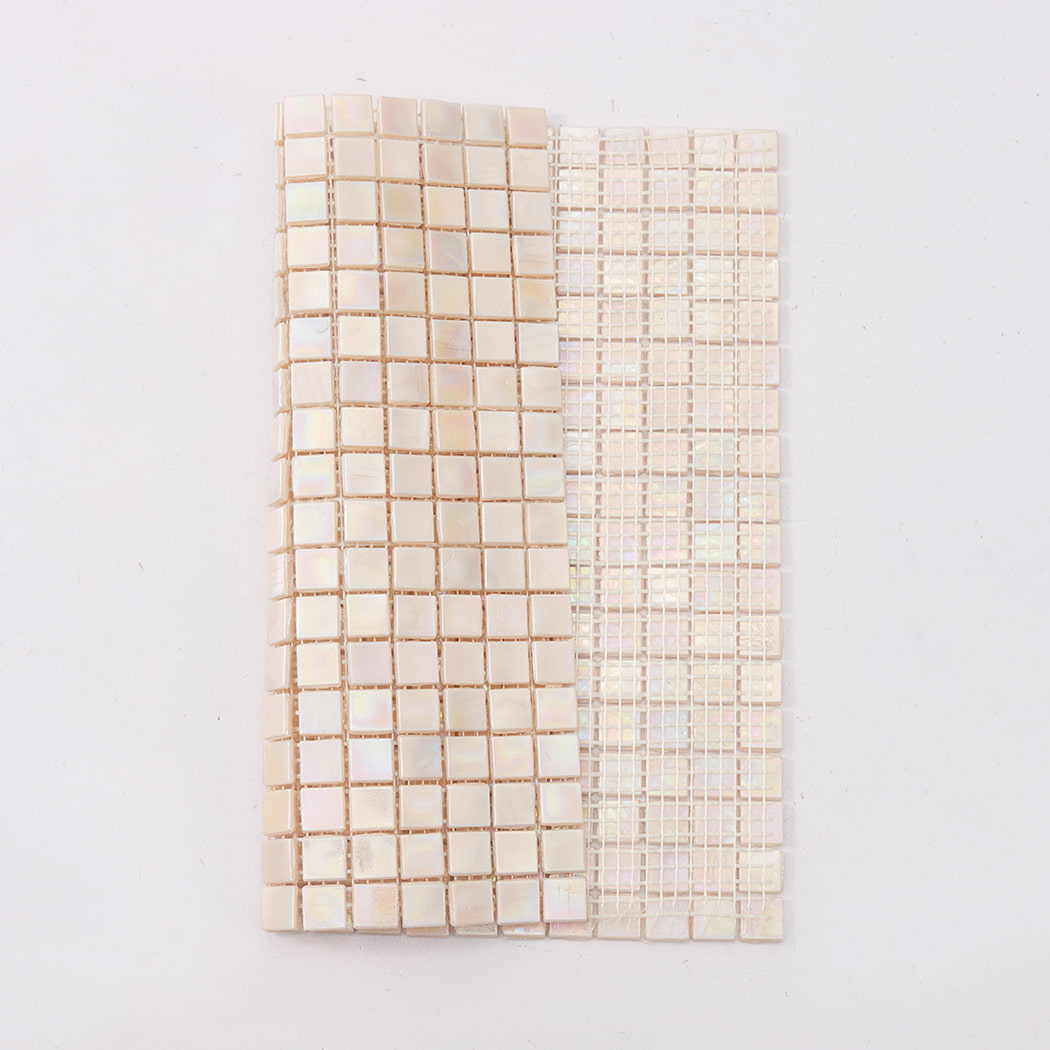 Soft pink iridescent square glass mosaic tile sheet showing front and mesh backing