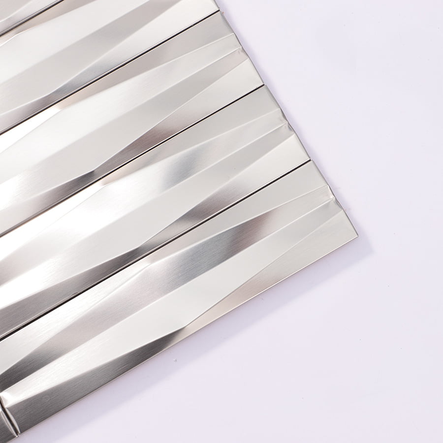 Angle view of stainless steel silver 3D strip wall tile