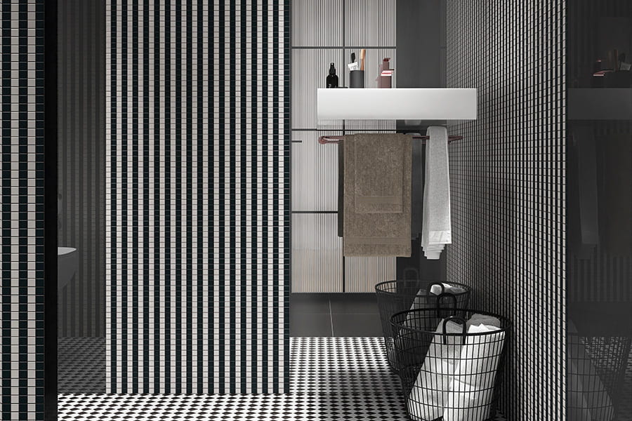 Modern bathroom interior with black and white striped tiles