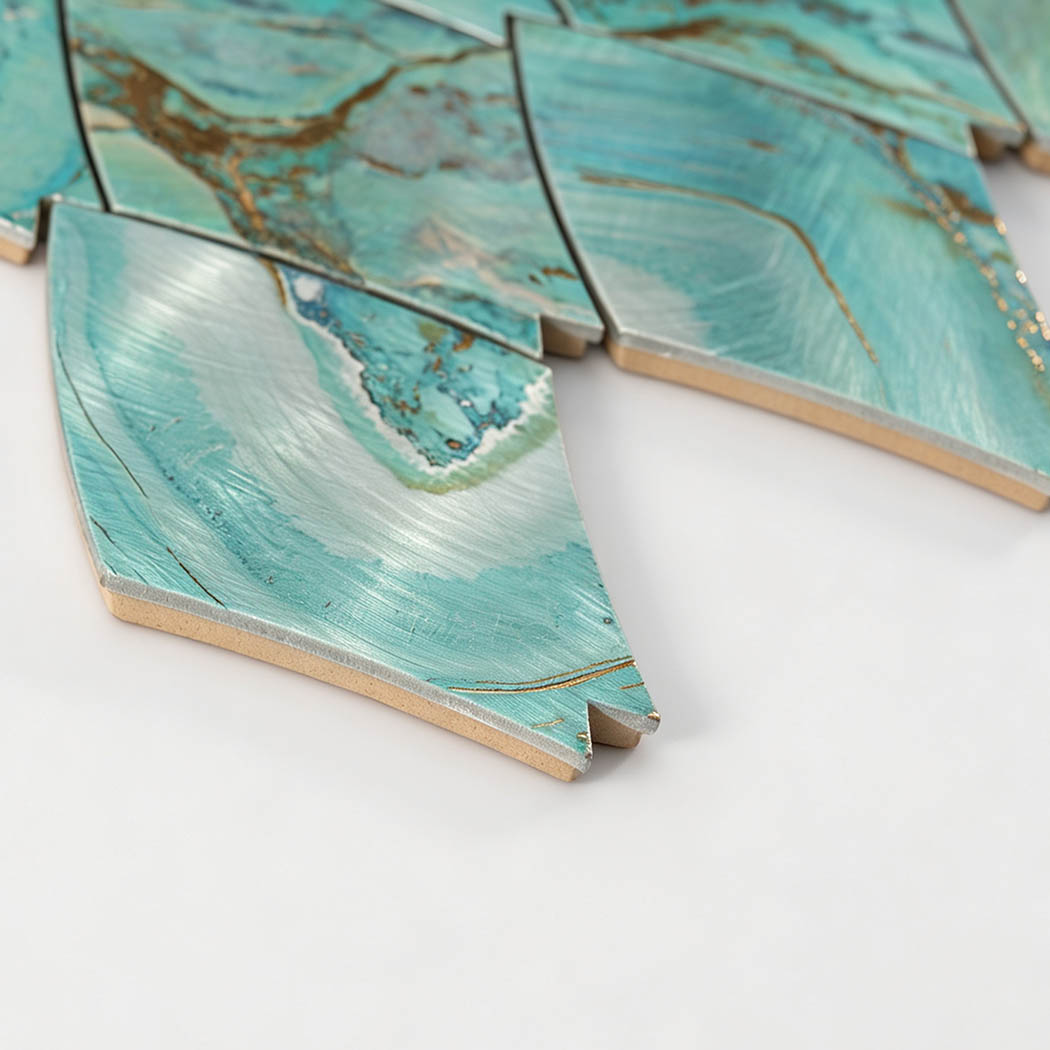 Side view showing edge profile of teal gold leaf aluminum mosaic tile