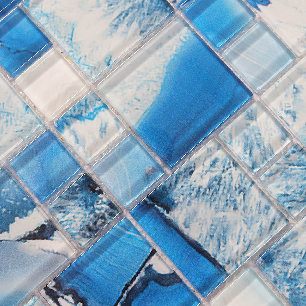 Close detail of blue and white square glass mosaic with translucent blue tiles