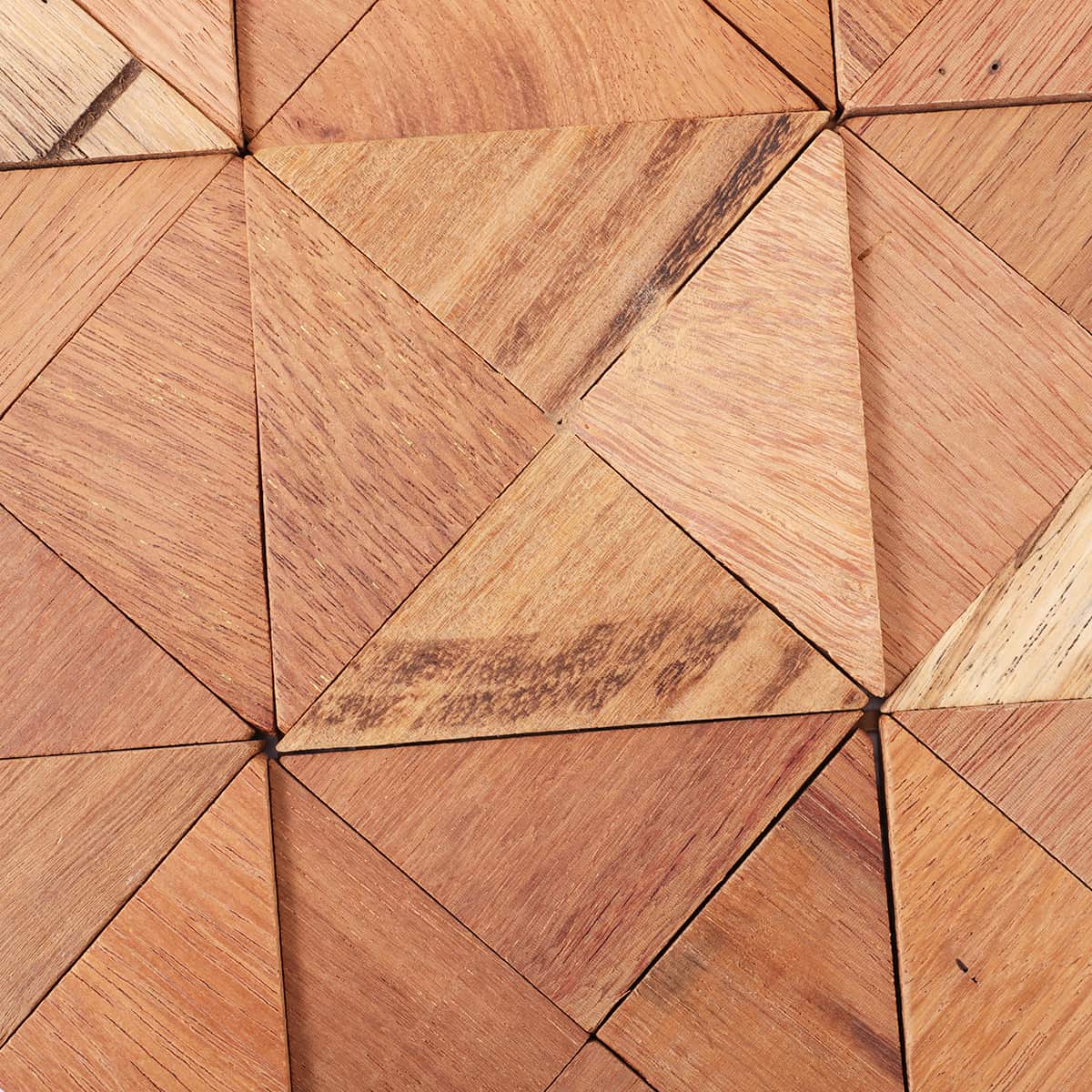 Detail of triangle wood mosaic showing texture and grain