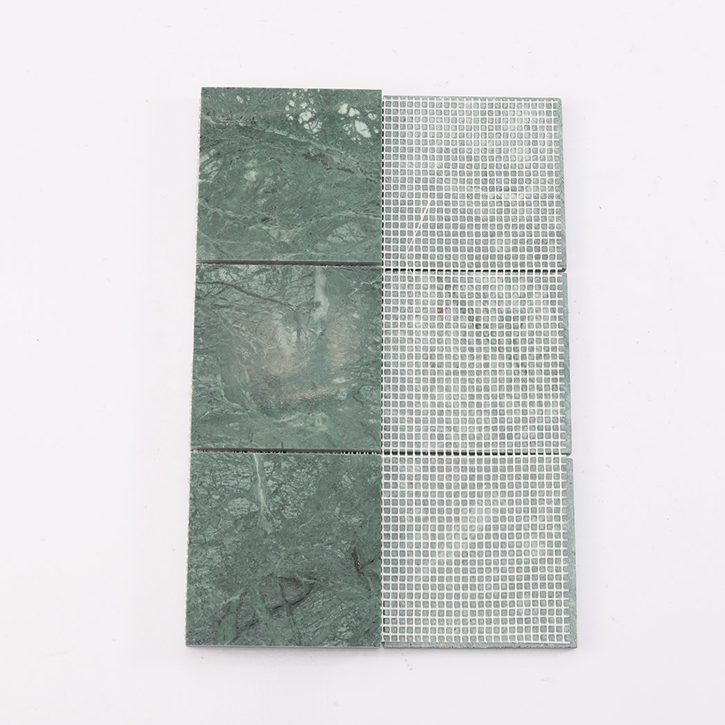 Back view of verde green large square marble tile with mesh mounted backing