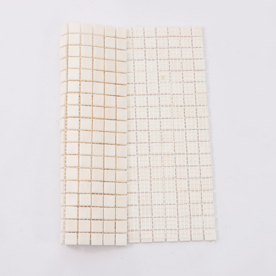 Very light pink square glass mosaic tile sheet showing front and mesh backing