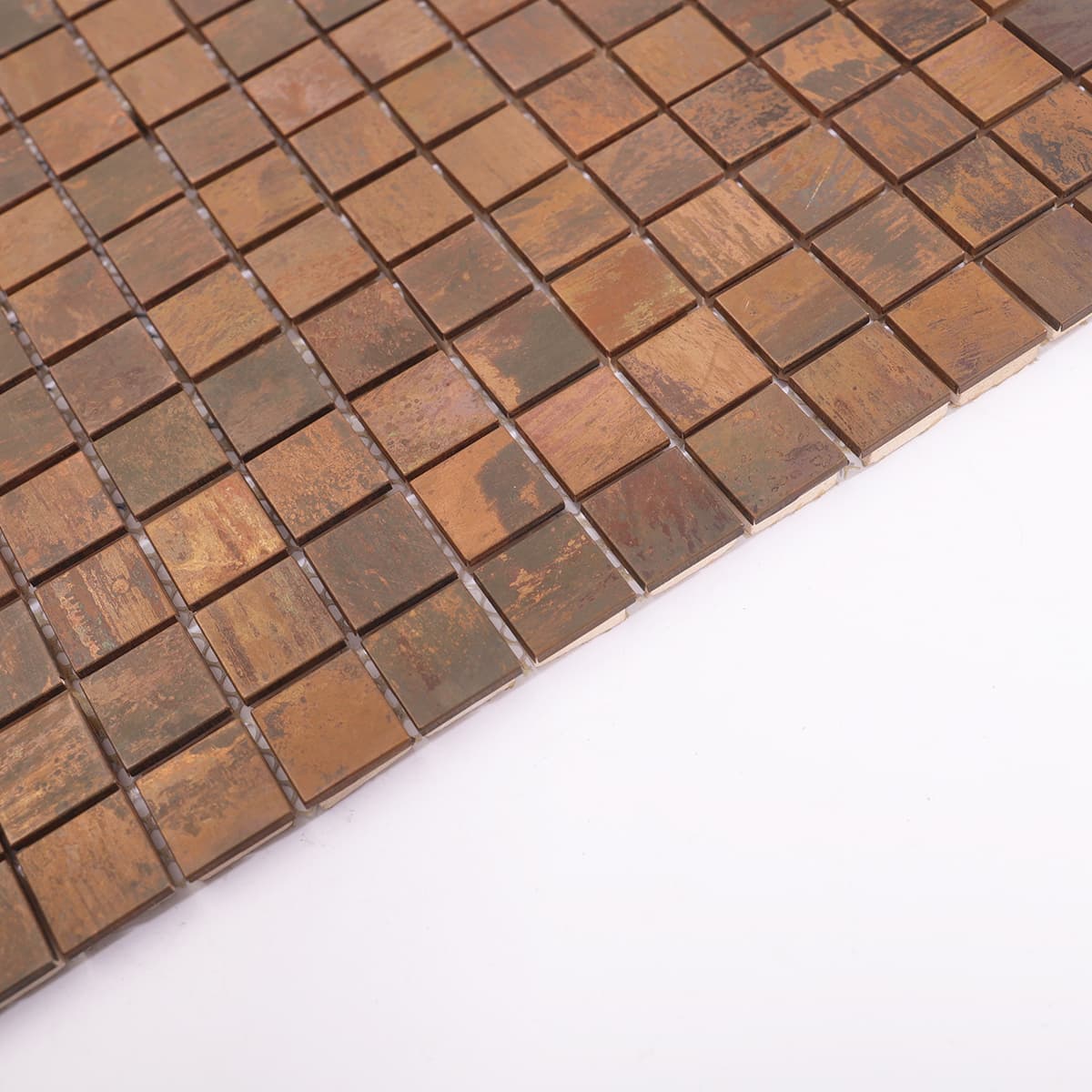 Side edge view of flat vintage copper tile with rustic finish