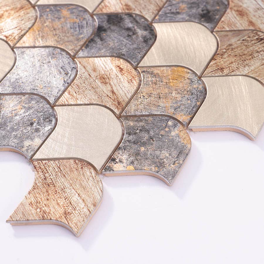 Edge closeup of vintage gray and brown fan shape aluminum mosaic tiles