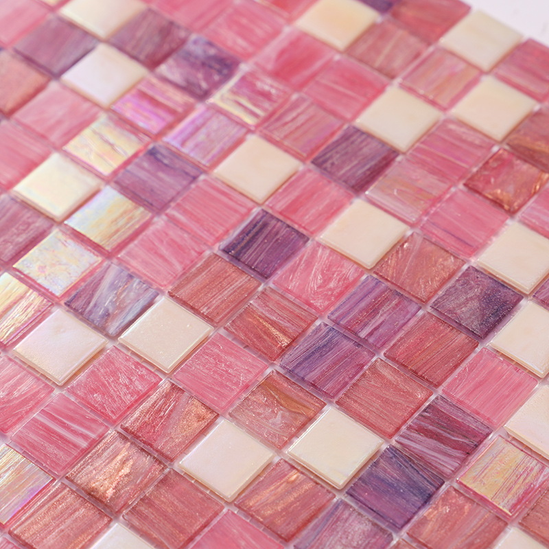 Close-up of Mixed Pink Vitreous Glass Mosaic Tiles in Various Shades and Finishes