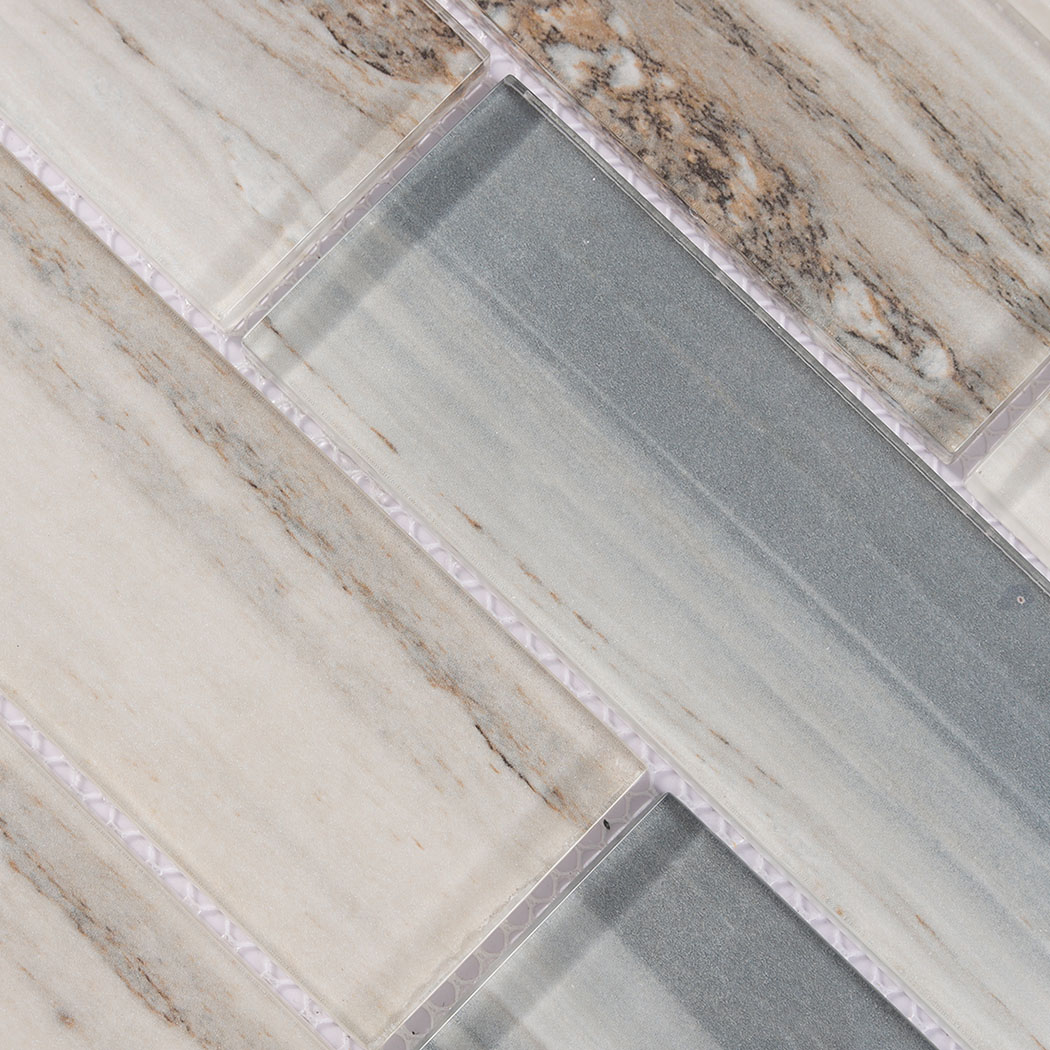Cream beige and smoky gray glass subway tiles with layered stone texture