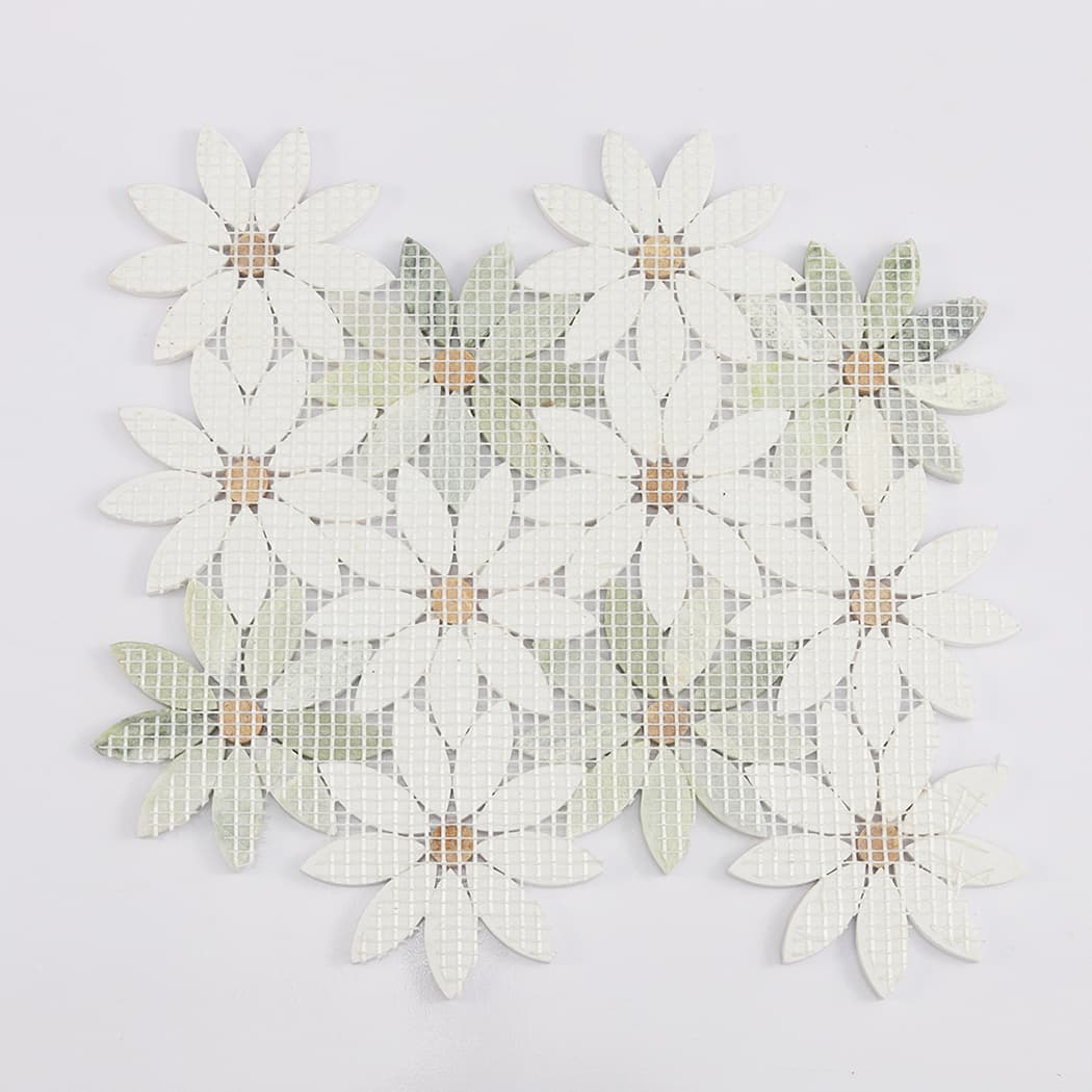Back view of a floral marble mosaic tile showing the mesh netting and daisy patterns.