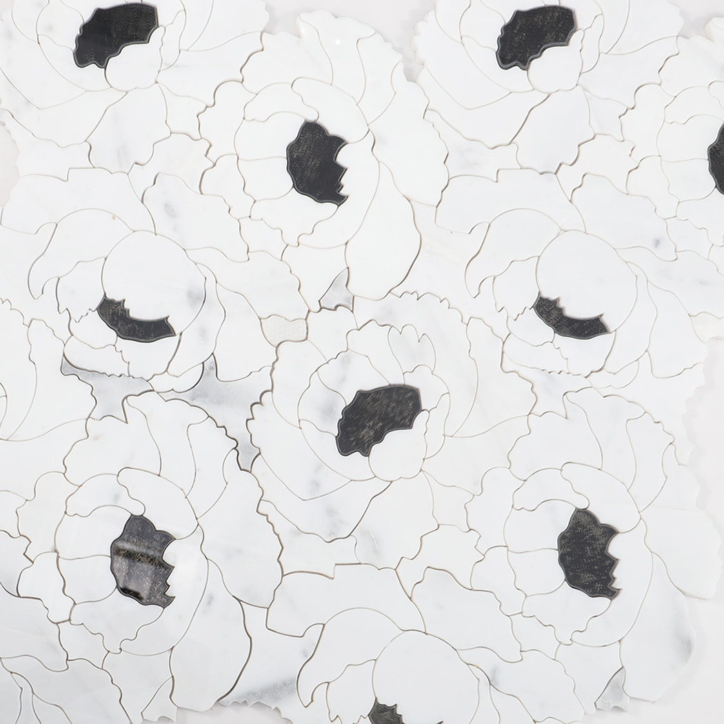 Layout view of white floral marble mosaic tiles with black stone centers covering the surface.
