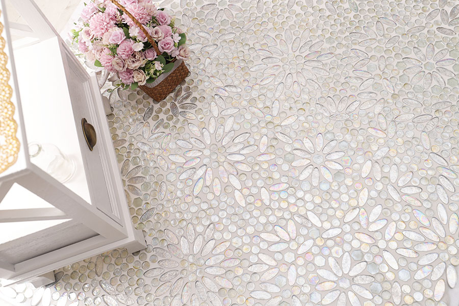 Elegant white floral tiles made of shimmering hand-cut glass mosaics for wall and floor decor.