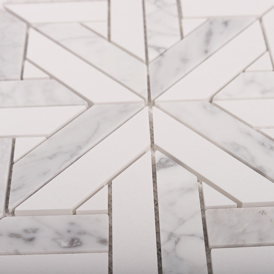 Angled view of white geometrica Thassos honed marble mosaic tile