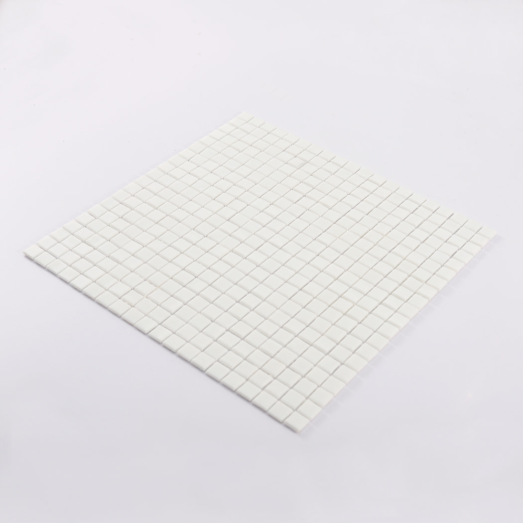 Angled perspective of white glass mosaic tile sheet for wall and floor use