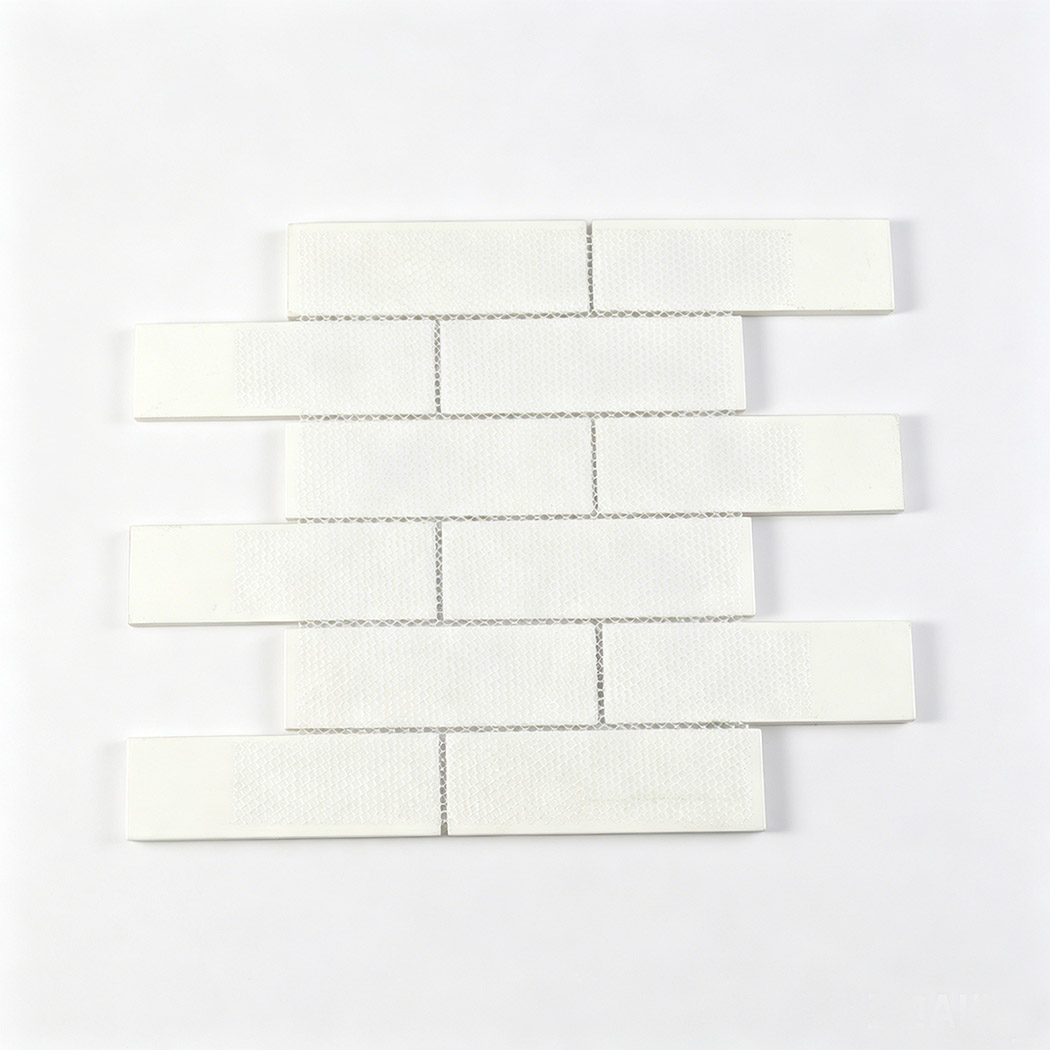 Back view of white glass subway mosaic sheet with mesh mounted backing