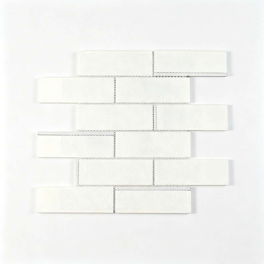 Back view of white glass subway tile sheet with white mesh mounting