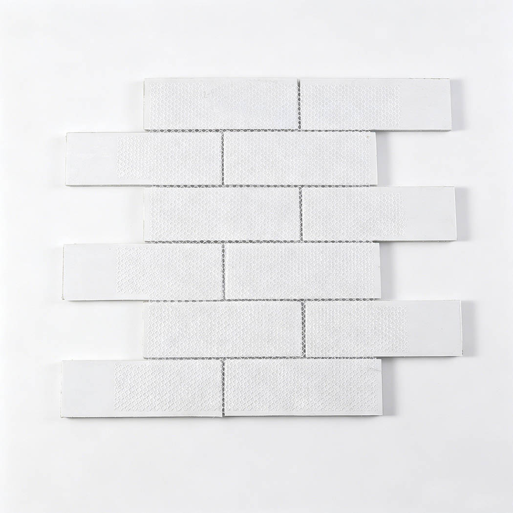 White mesh mounted underside of white gray glass subway brick tile sheet
