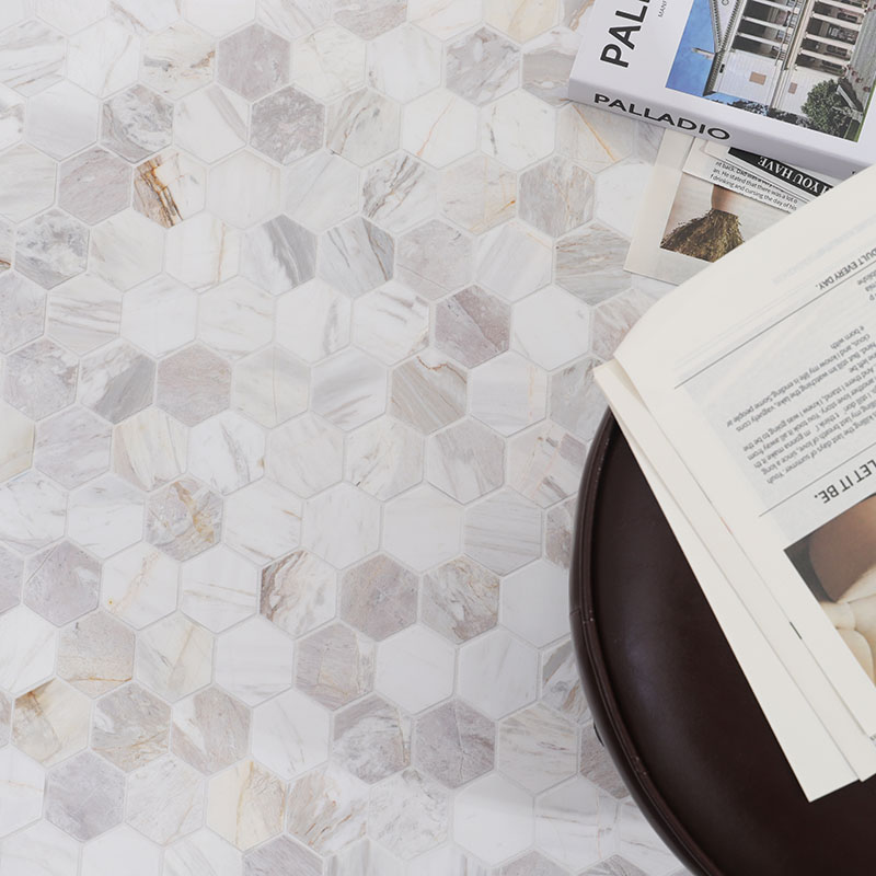 White and gray marble hexagon mosaic tile floor with natural stone veining