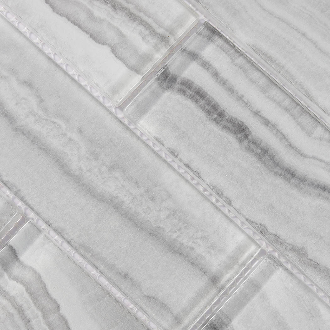 White gray glass subway tile texture with flowing wave like stone lines