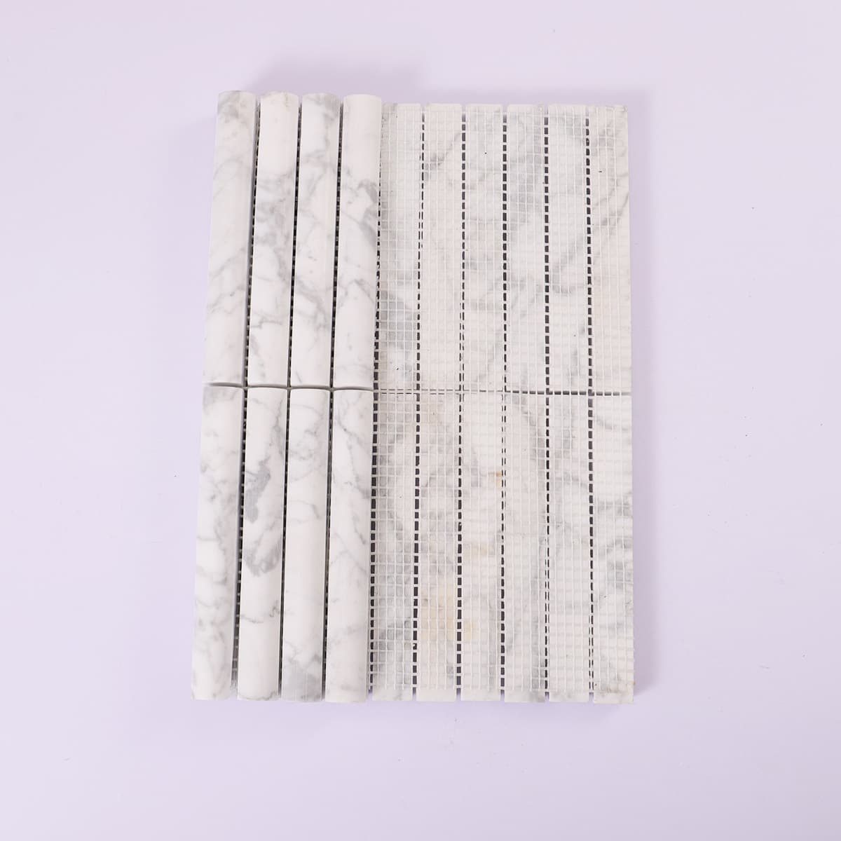  Back side showing mesh backing of white marble mosaic