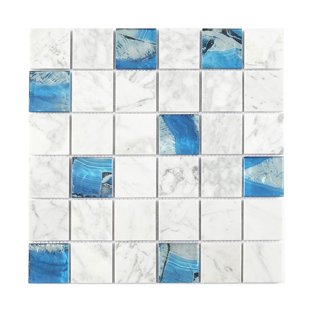 Front view of white marble square mosaic with random glossy blue glass pieces