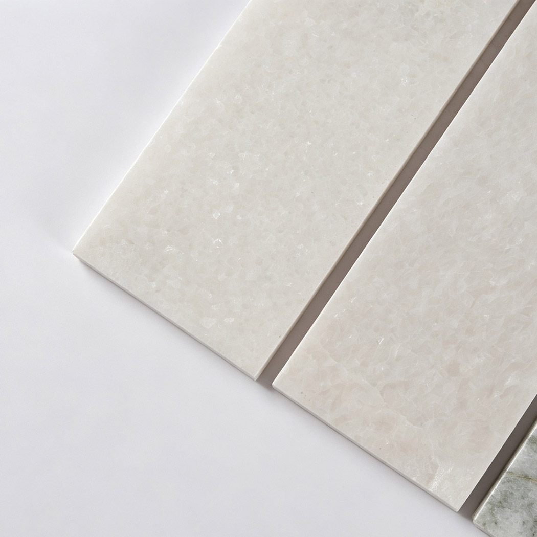 Close-up of white marble strips showing a fine natural crystalline texture