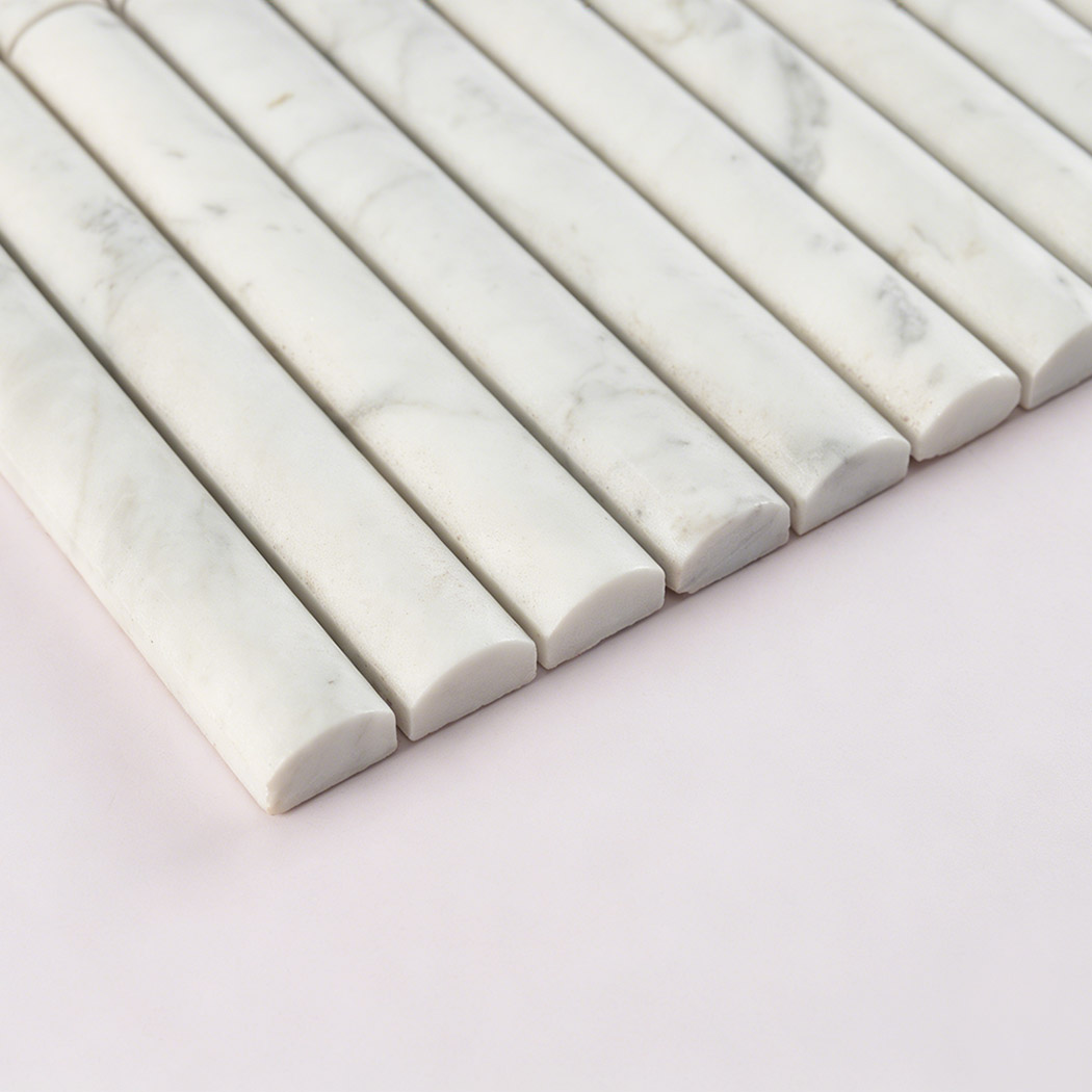 ide view of white marble fluted rod mosaic tile showing thickness and rounded edges
