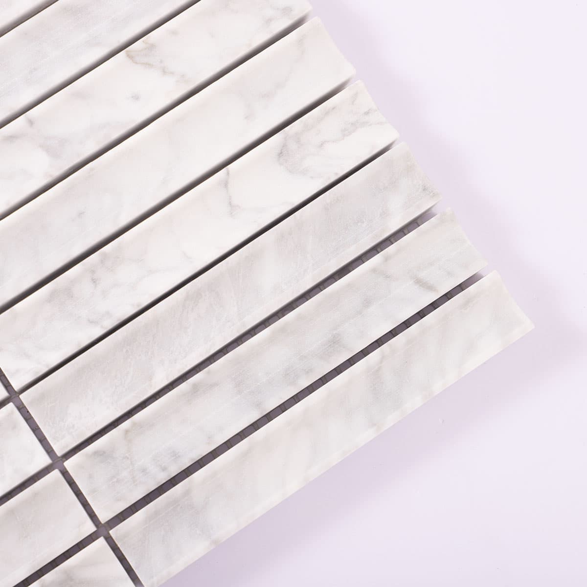 Top corner angle of fluted white marble mosaic tile