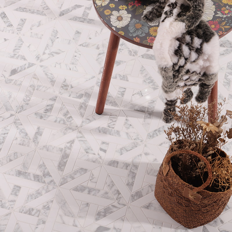 Close-up of white marble floor with geometric mosaic pattern