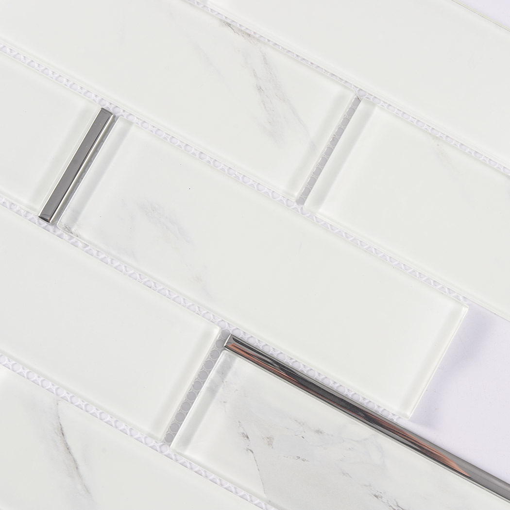 White marble glass subway tile detail with beveled edges and metallic silver lines