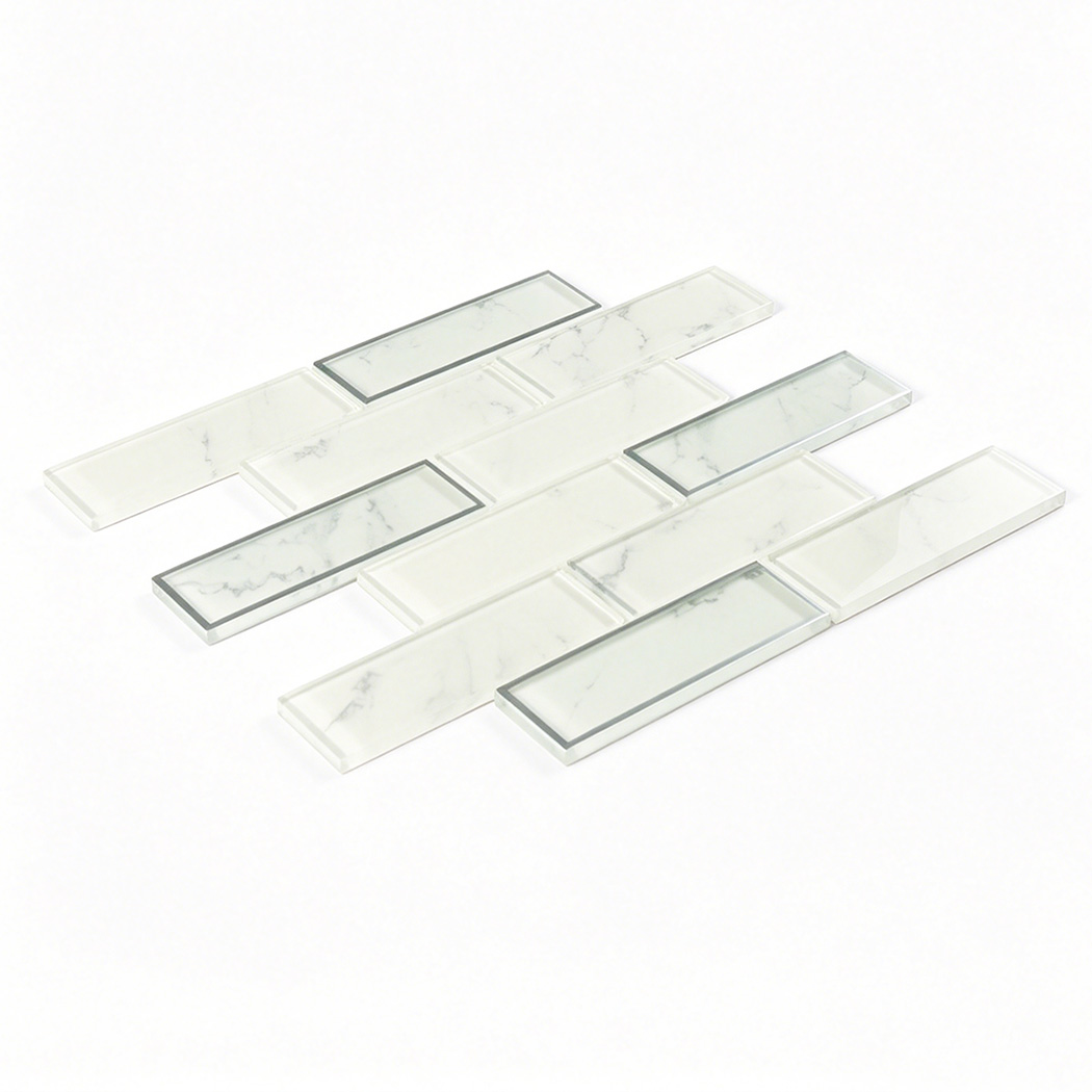 White marble look glass subway tile sample with silver framed rectangles
