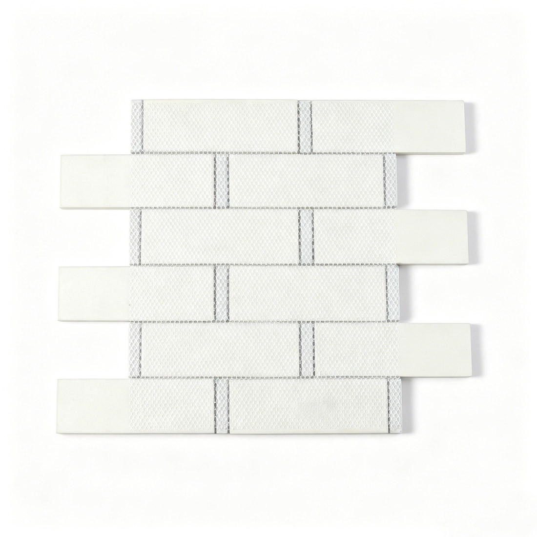Back view of white marble look glass mosaic tile on mesh backing